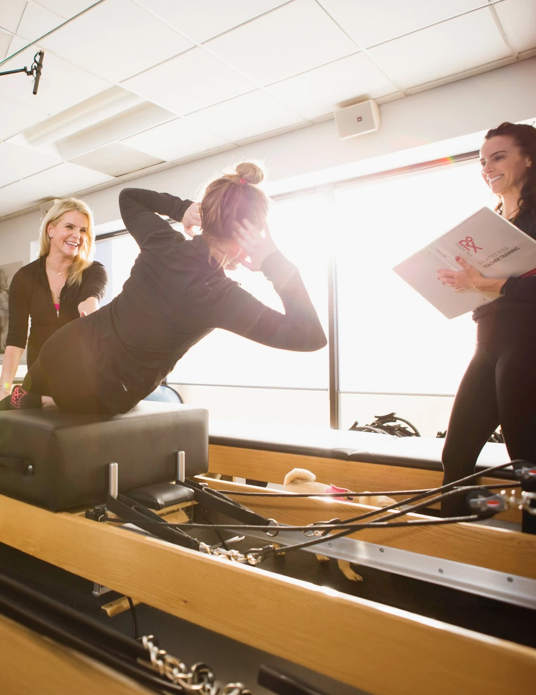 Noelle Rox teaching Pilates in a studio