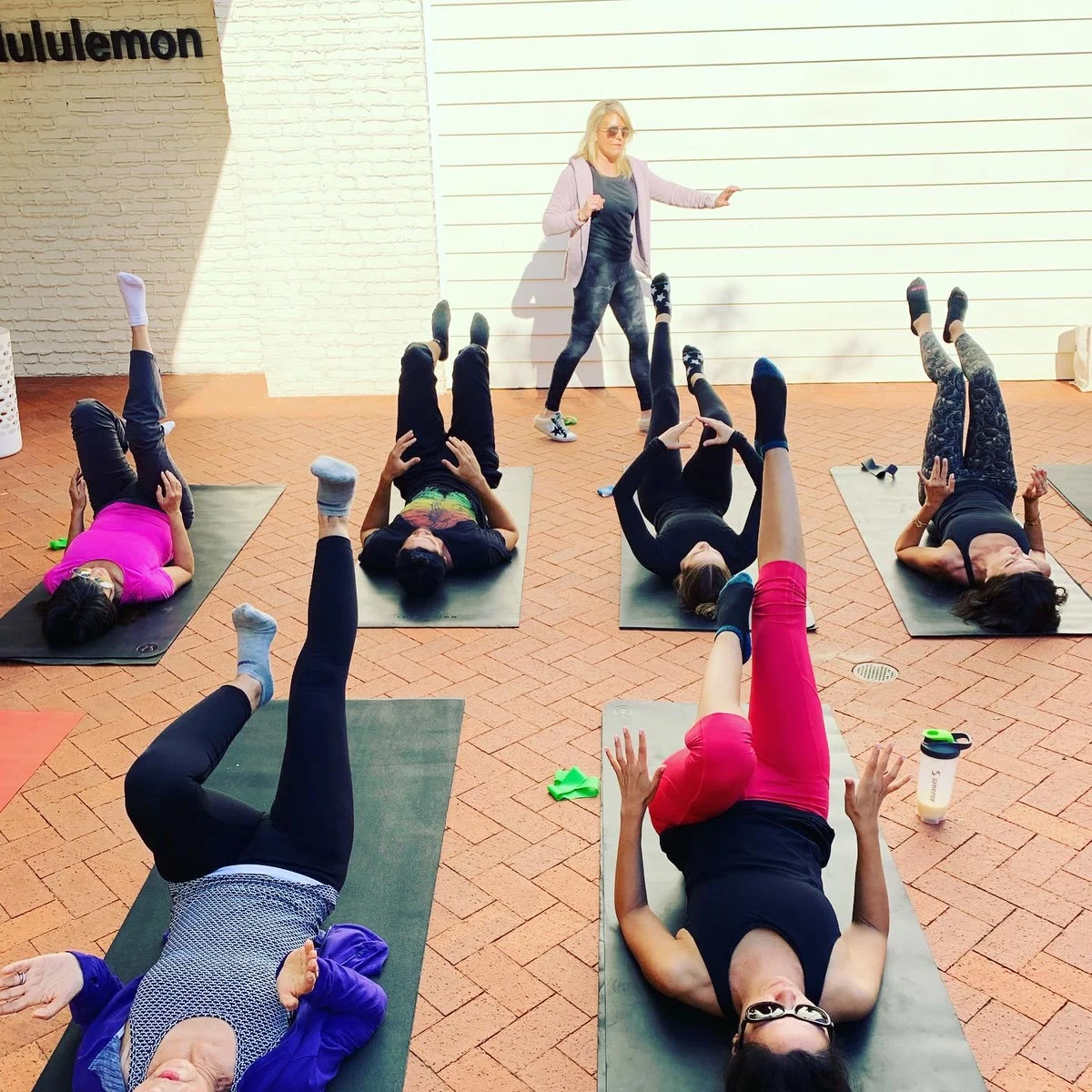 Noelle Rox guiding a Pilates workshop